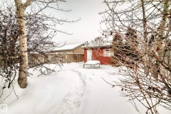 View of yard layered in snow - 
