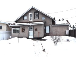 View of front of home featuring stucco siding - 