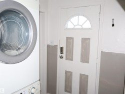 Washroom with stacked washer / dryer - 