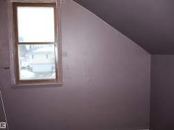 Additional living space featuring vaulted ceiling - 