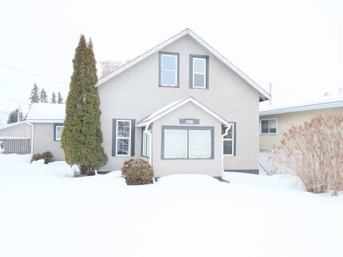 Traditional-style home with stucco siding - 4511 53 Ave, Barrhead, AB - Outdoor
