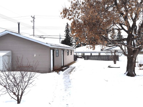 View of yard layered in snow - 4511 53 Ave, Barrhead, AB - Outdoor