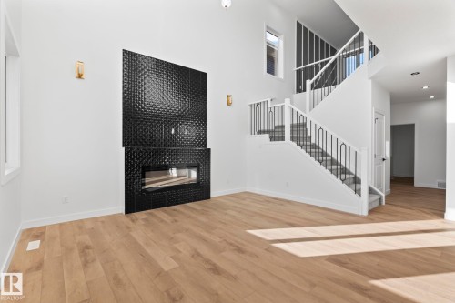 18215 94 Street, Edmonton, AB - Indoor Photo Showing Other Room With Fireplace