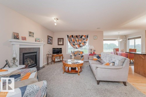 6227 5 Avenue, Edmonton, AB - Indoor Photo Showing Living Room With Fireplace