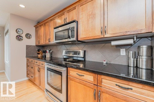 6227 5 Avenue, Edmonton, AB - Indoor Photo Showing Kitchen With Stainless Steel Kitchen