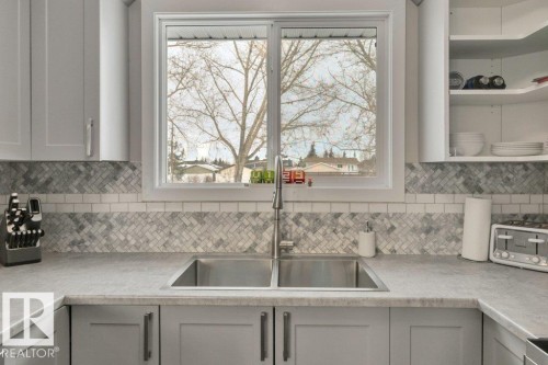 4024 37 Avenue, Leduc, AB - Indoor Photo Showing Kitchen With Double Sink