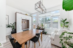 Dining area featuring light wood finished floors - 