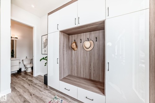 Mudroom with light wood-style floors - 8321 80 Avenue, Edmonton, AB - Indoor Photo Showing Other Room