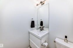 Bathroom with vanity and toilet - 