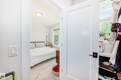 Bedroom with light carpet - 