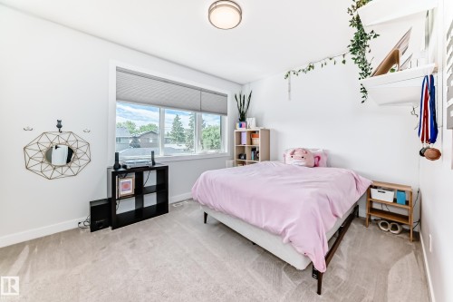 Bedroom featuring carpet floors - 8321 80 Avenue, Edmonton, AB - Indoor Photo Showing Bedroom