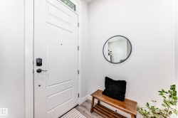 Entrance foyer featuring light wood-style flooring - 