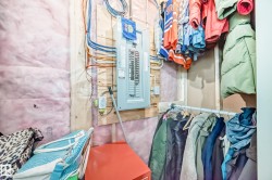 Utility room featuring electric panel - 