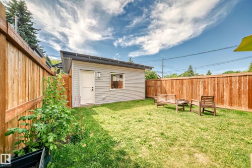 Fenced backyard featuring an outbuilding - 8321 80 Avenue, Edmonton, AB - Outdoor