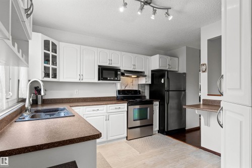 602 9929 113 Street, Edmonton, AB - Indoor Photo Showing Kitchen With Double Sink