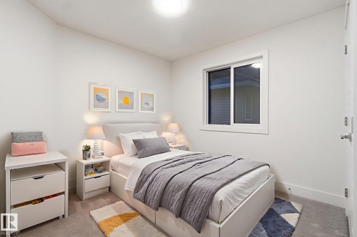 Bedroom featuring light carpet - 2532 210 Street, Edmonton, AB - Indoor Photo Showing Bedroom