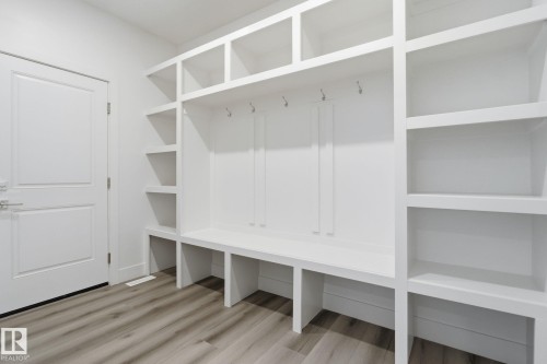 Mudroom featuring light wood-style flooring - 2532 210 Street, Edmonton, AB - Indoor With Storage