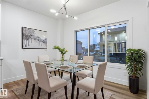 Dining area with light wood-type flooring - 2532 210 Street, Edmonton, AB - Indoor Photo Showing Dining Room