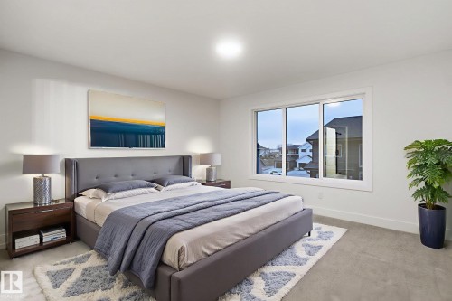 Carpeted bedroom featuring baseboards - 2532 210 Street, Edmonton, AB - Indoor Photo Showing Bedroom