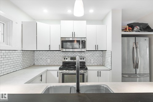 12034 37 Street, Edmonton, AB - Indoor Photo Showing Kitchen With Stainless Steel Kitchen With Double Sink With Upgraded Kitchen