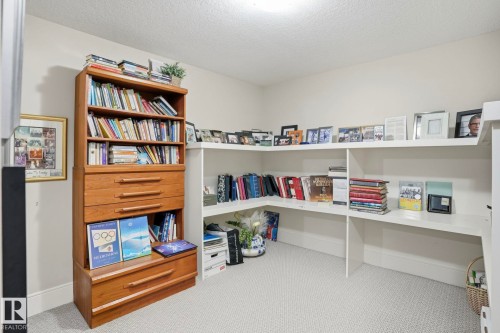 Office with carpet flooring and a textured ceiling - 11121 81 Avenue, Edmonton, AB - Indoor