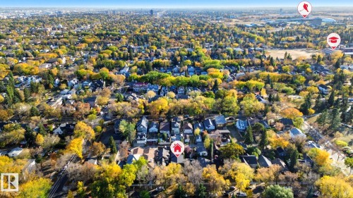 View of property location featuring nearby suburban area and a tree filled landscape - 11121 81 Avenue, Edmonton, AB - Outdoor With View