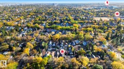 View of property location featuring nearby suburban area and a tree filled landscape - 