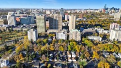 View of city with a tree filled landscape - 