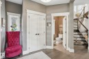 Foyer entrance with stairway and wood finished floors - 11121 81 Avenue, Edmonton, AB  - Indoor Photo Showing Other Room 