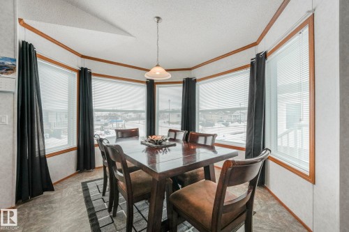 Great space with so much NATURAL LIGHT. Check out all these windows!!! - 2055 Aspen Crescent, Leduc, AB - Indoor Photo Showing Dining Room