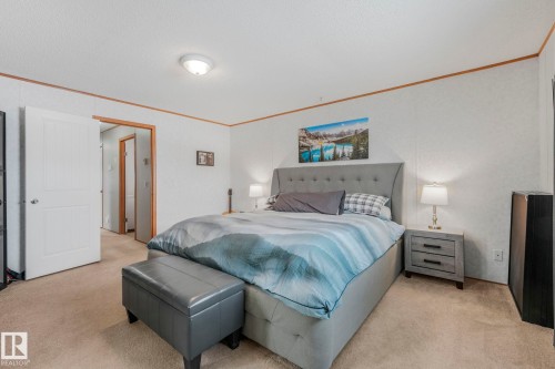 Plenty of room for a KING SIZE bed. Enjoy the walk in closet and a 4 piece ensuite with a jacuzzi tub! Amazing space to unwind after a long day - 2055 Aspen Crescent, Leduc, AB - Indoor Photo Showing Bedroom