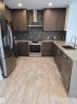 206 1316 Windermere Way, Edmonton, AB  - Indoor Photo Showing Kitchen With Double Sink With Upgraded Kitchen 