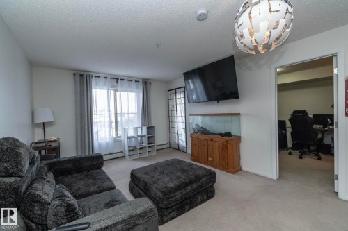 215 5810 Mullen Place, Edmonton, AB - Indoor Photo Showing Living Room