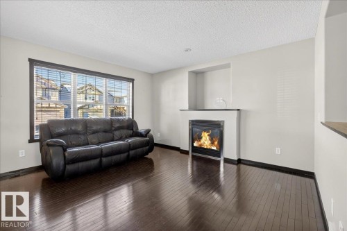 3623 13 Street, Edmonton, AB - Indoor Photo Showing Living Room With Fireplace