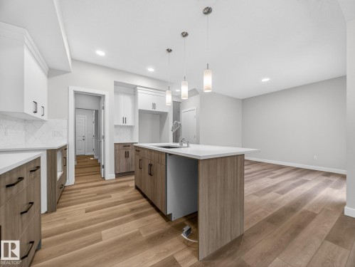 364 Bluff Cove, Leduc, AB - Indoor Photo Showing Kitchen With Upgraded Kitchen