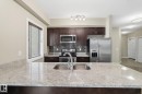 214 1238 Windermere Way, Edmonton, AB  - Indoor Photo Showing Kitchen With Stainless Steel Kitchen With Double Sink With Upgraded Kitchen 