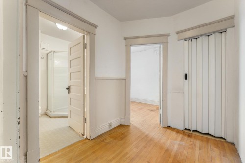 Hallway with light floors - 10921 126 Street, Edmonton, AB - Indoor Photo Showing Other Room