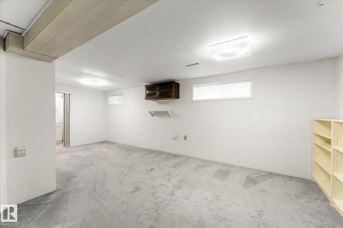Basement with carpet - 10921 126 Street, Edmonton, AB - Indoor Photo Showing Basement