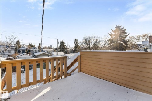 Wooden terrace with a residential view - 10921 126 Street, Edmonton, AB - Outdoor