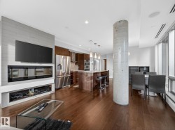 Living room featuring dark wood finished floors - 