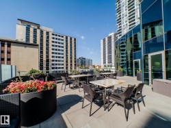 View of patio / terrace with outdoor dining space and a city view - 