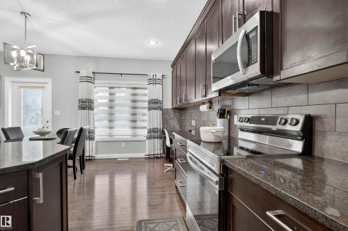 SS Appliances - 618 Adams Way Sw, Edmonton, AB - Indoor Photo Showing Kitchen With Upgraded Kitchen