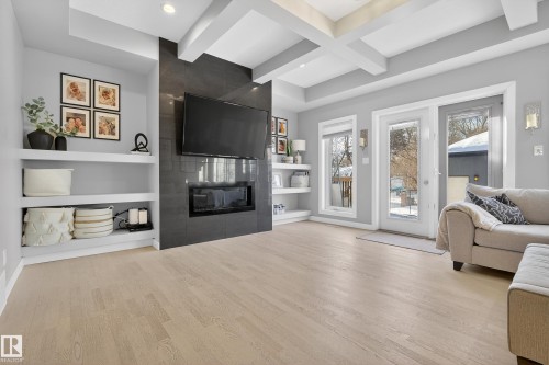 11016 122 Street Nw, Edmonton, AB - Indoor Photo Showing Living Room With Fireplace