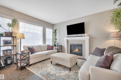 2394 Cassidy Way, Edmonton, AB - Indoor Photo Showing Living Room With Fireplace