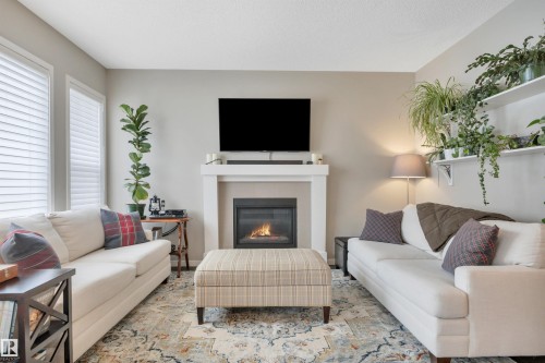 2394 Cassidy Way, Edmonton, AB - Indoor Photo Showing Living Room With Fireplace