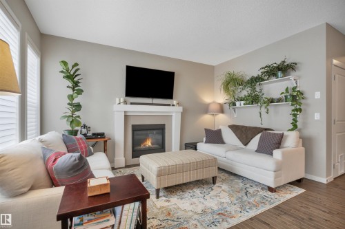 2394 Cassidy Way, Edmonton, AB - Indoor Photo Showing Living Room With Fireplace