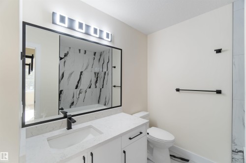 Legal suite bathroom - 8319 81Ave, Edmonton, AB - Indoor Photo Showing Bathroom