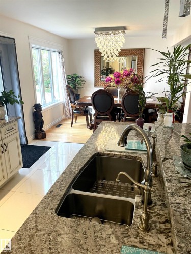 9720 65 Avenue, Edmonton, AB - Indoor Photo Showing Kitchen With Double Sink