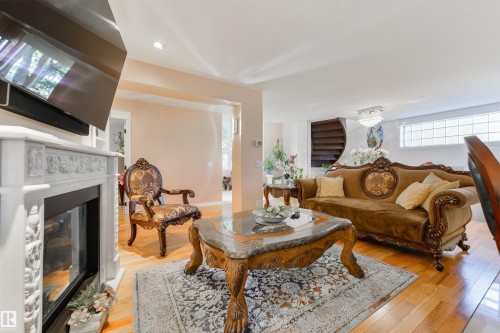 9720 65 Avenue, Edmonton, AB - Indoor Photo Showing Living Room With Fireplace