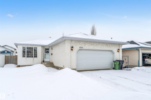 Ranch-style home featuring stucco siding and an attached garage - 6741 162A Avenue, Edmonton, AB - Outdoor